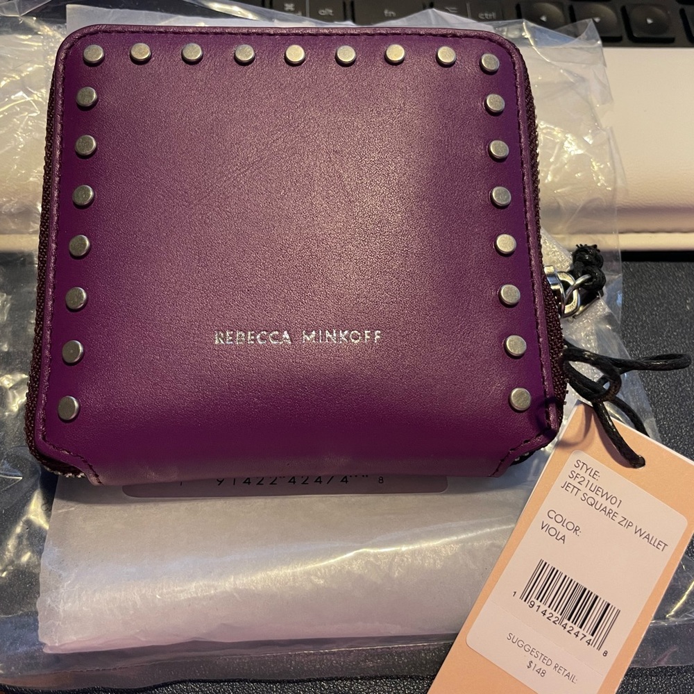 Rebecca Minkoff small zipper wallet with studs.